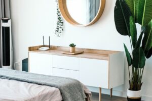 white wooden dresser with mirror