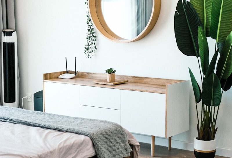 white wooden dresser with mirror